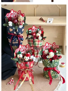 Exquisite Christmas apple bouquet packaging with festive plush dolls and red roses