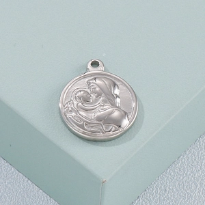 Silver retro Virgin Mary and Child round pendant on light green pedestal stand