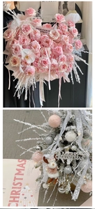 Detail showing glittery decorative floral sticks and Christmas tree DIY materials
