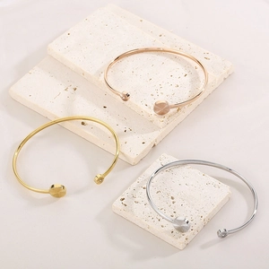 Three-color adjustable C-shaped bangle bracelets in gold, silver, and rose gold finishes