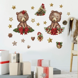Vue détaillée d'autocollants muraux de Noël avec ours et étoiles sur mur blanc