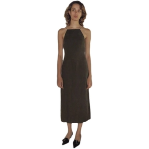 Close-up of olive green backless halter dress with waist cut-outs and a high slit