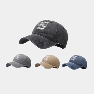 Vintage washed cotton baseball cap featuring embroidered lettering in multiple classic colors