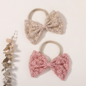 Set of two lace bow baby headbands with floral embroidery and soft nylon bands