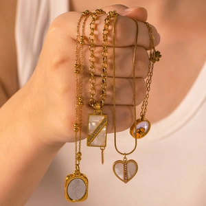 Gold stainless steel necklaces with mother of pearl shell pendants and zircon stones