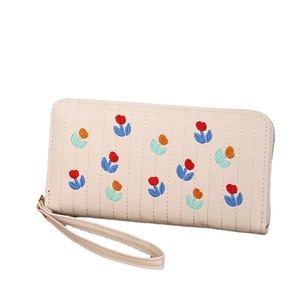 Beige faux leather long wallet with tulip embroidery and convenient hand strap