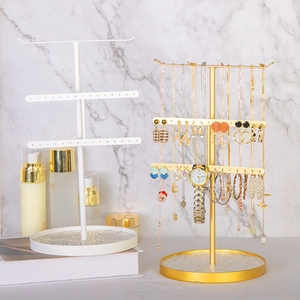 Three-tier metal jewelry organizer with marble base for necklaces and earrings