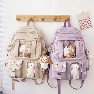Large capacity Japanese style school backpack with cute plush toys and multi-pocket design