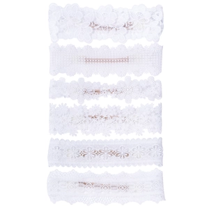 Set of six white lace floral headbands with diverse embroidery patterns for baby girls