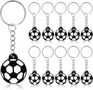 Detailed grid view of 11-piece black and white soccer ball PVC keychains set