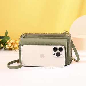 Green litchi texture crossbody phone bag with three zippers showing large phone fit