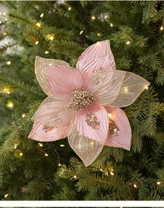 Macro view of 25cm pink and gold poinsettia flower with sequins for Christmas tree decor