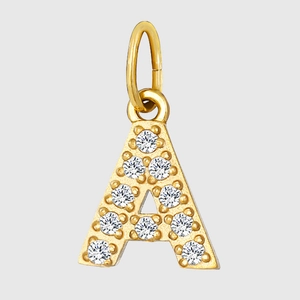 Macro detail of gold stainless steel letter A pendant with clear zircon inlay gems