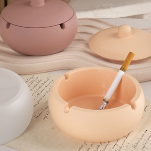 Moule silicone minimaliste pour bougies ovales avec couvercles aux tons pastels doux