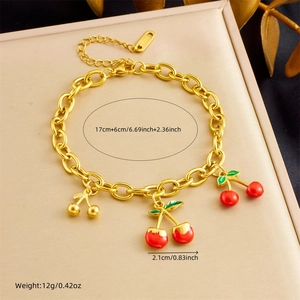 Gold cherry and heart lock pendant bracelet with red enamel charms and 17+6cm chain length