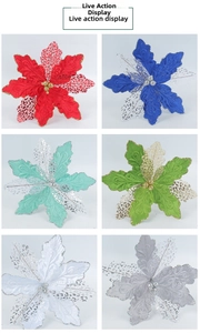 Detail of glitter poinsettia ornaments in red, blue, green, white, and silver colors