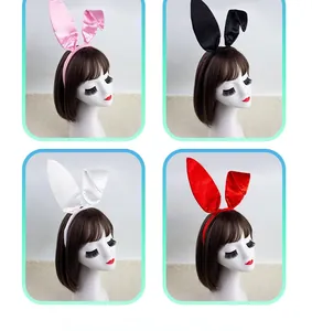 Detail view of satin bunny ear headbands in pink black white and red colors