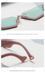 Detail of ergonomic pink frame nose pads and temples on vintage sunglasses