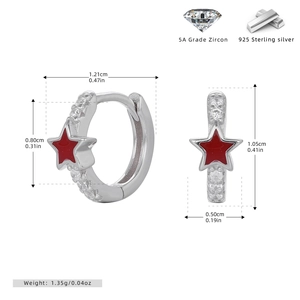 Detail view of S925 sterling silver star earring with red oil drop and 5A zircon details