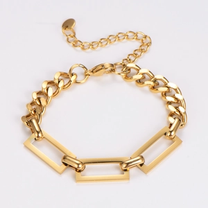 Detail shot of the golden chunky metal chain link bracelet with rectangular geometric links