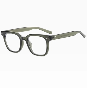 Close-up of translucent green square sunglasses showing side temple and size markings