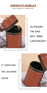 Detail of brown woven faux leather lipstick pouch with metal zipper and hanging hook