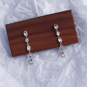 Minimalist S925 sterling silver tassel drop earrings in a unique irregular design