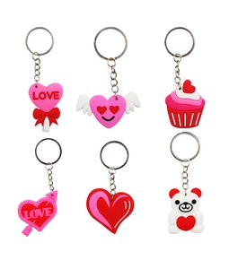 Detailed set of 6 PVC heart-shaped keychains with Cupid, teddy bear, and Love motifs