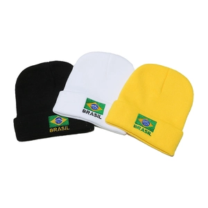 Winter knit beanies in black, white, and yellow featuring Brazil flag embroidery