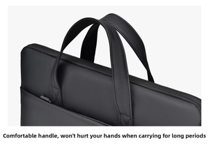 Detail of reinforced double handles on a waterproof black laptop bag with cross-stitching
