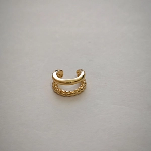 Detailed macro view of a gold-plated S925 silver double-layered minimalist ear cuff