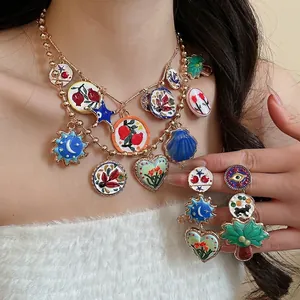 Colorful enamel geometric heart charm necklace and earring set with bohemian style elements