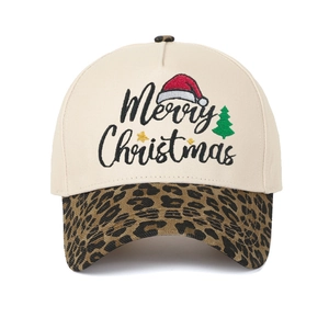Close-up of Merry Christmas embroidery and leopard print brim on a retro baseball cap