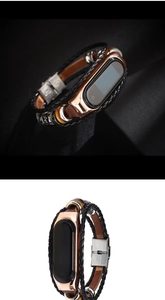 Detail of vintage braided leather strap with rose gold frame for Mi Band smart bracelet