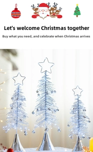 Three sizes of silver wire Christmas trees with LED fairy lights and star toppers