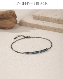 Detail of vintage punk S925 silver bracelet with turquoise inlay and black gun finish