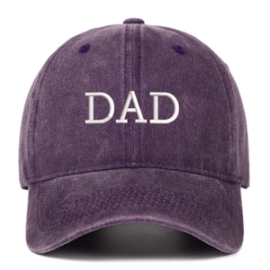 Close-up of DAD embroidery on dark purple washed cotton vintage baseball cap