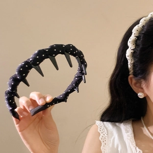 Polka dot wavy headband with non-slip teeth for women in black and white colors