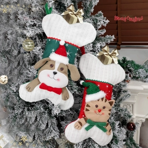 Bone shaped Christmas stockings with cat and dog embroidery on knit white fabric