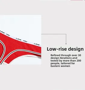Detailed macro view of red ribbed cotton fabric and LOVE YOU elastic waistband