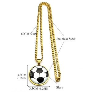 Golden stainless steel football pendant necklace with 60cm chain on white background