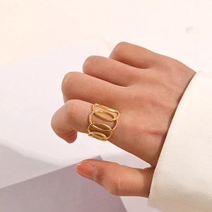 Gold-plated stainless steel oval geometric layered ring in a minimalist cross design