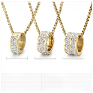 Detailed comparison of three gold stainless steel hip hop ring pendants with rhinestones