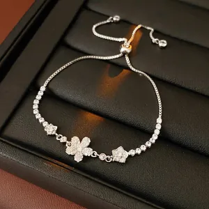 Elegant silver flower bracelet with sparkling zircons and adjustable slider chain