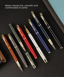 Detailed view of luxury rollerball pens with classic arrow clips in various metallic finishes