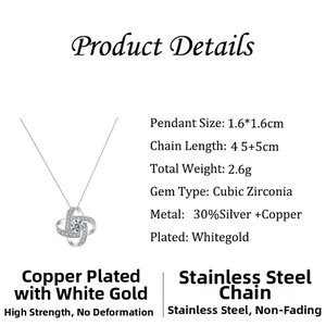 Detail view of rotating four-leaf clover pendant with zircon pavé and product dimensions