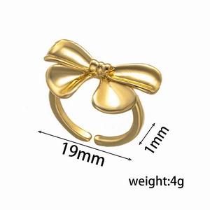 Minimalist golden bow open ring with 19mm inner diameter shown at a 45-degree angle