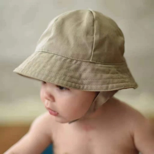 Detail of khaki cotton twill baby sun hat with embroidered brim for UV protection