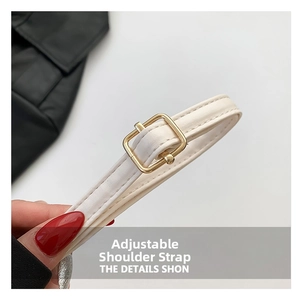 Detail of adjustable cream white faux leather shoulder strap with gold-tone buckle