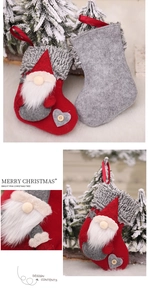 Close-up of Nordic gnome Christmas stocking with fuzzy faux fur cuff and wooden button details
